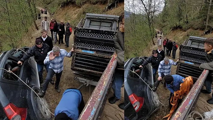 Trabzon'da araç uçurumda mahsur kaldı: Mahalle sakinlerinin yardımıyla kurtarıldı